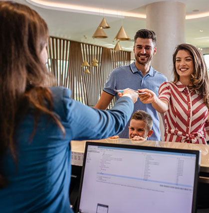 Hotel staff providing professional service at Time Square Inn